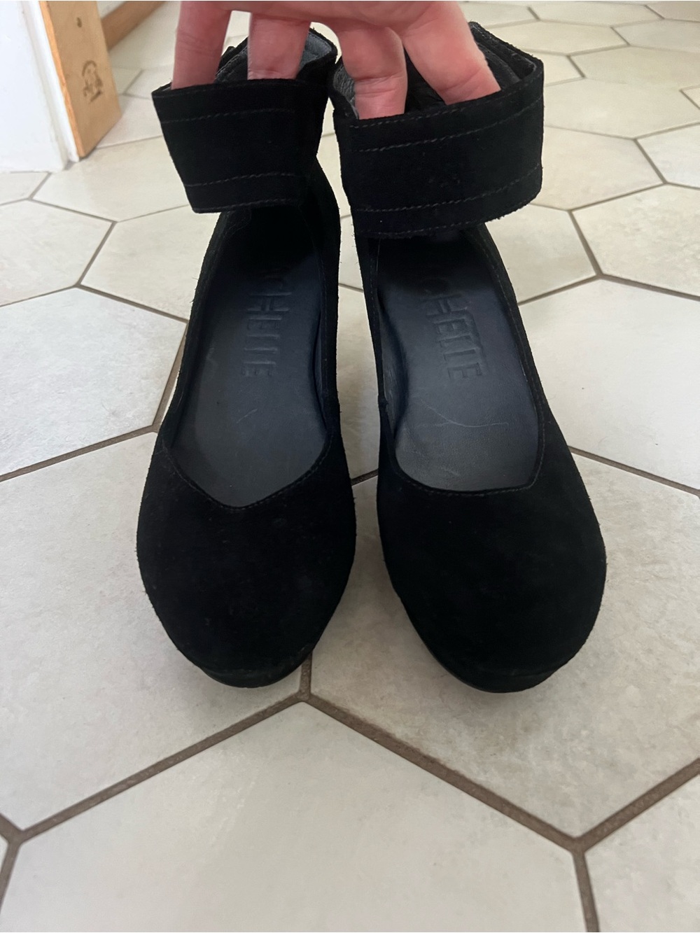 Black velour heels with ankle strap